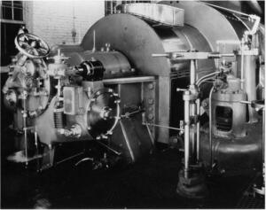 Parsons Turbine. Newly commissioned turbine showing governor end and main steam stop valve.