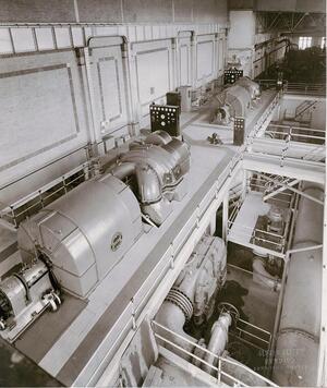 Parsons Turbine #2 in foreground and #1 unit in background, with cooling water lines one level below to the right of each unit.
